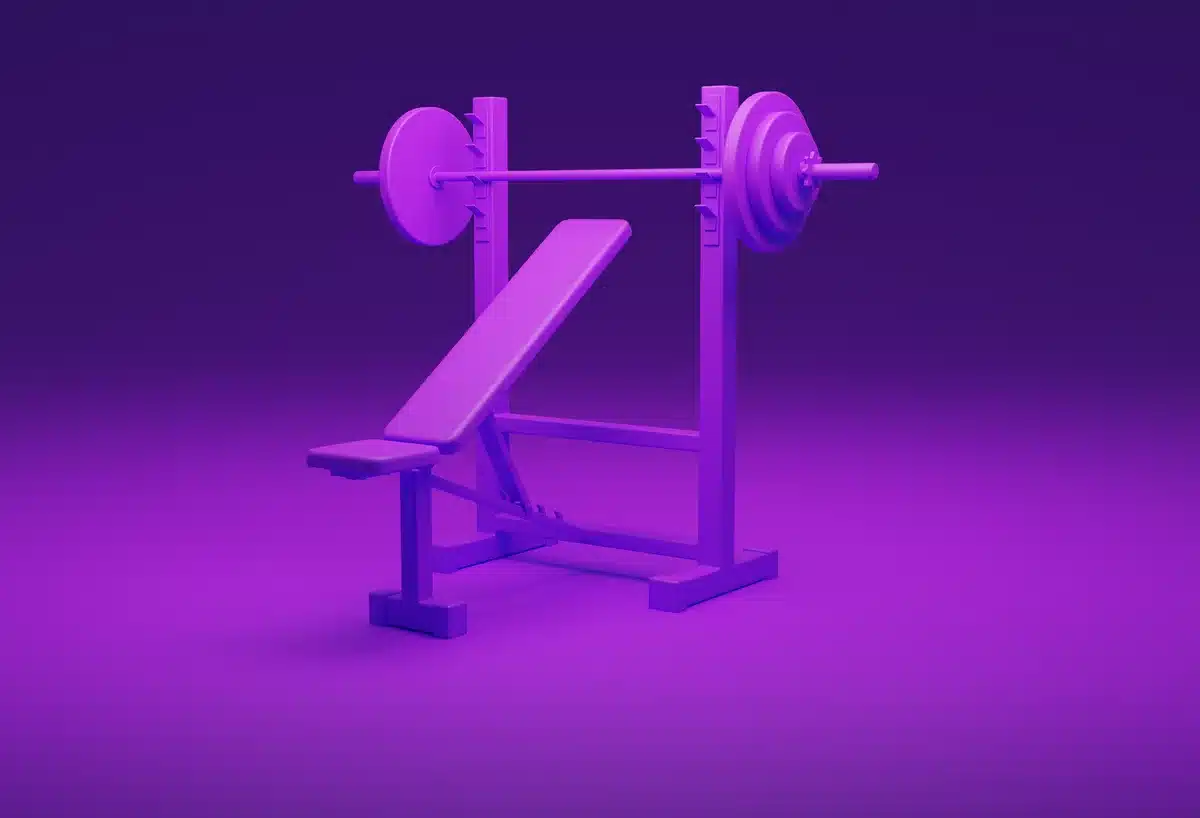 Athlète effectuant un développé couché avec une barre, technique de levage correcte